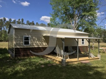 Metal Hunting Cabin | Boxed Eave Roof | 24W x 36L x 9H | Lean-to Porch